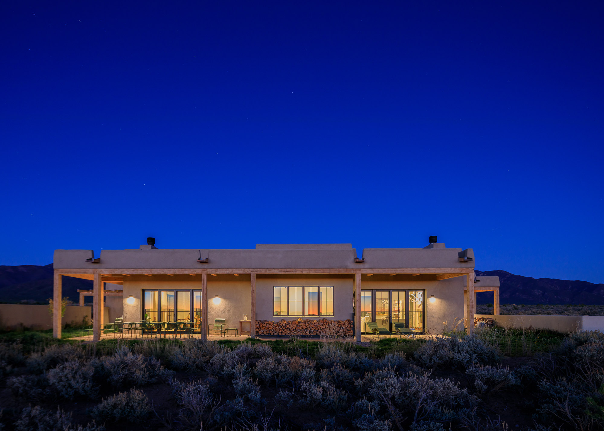 custom adobe home in the sage of Taos nm